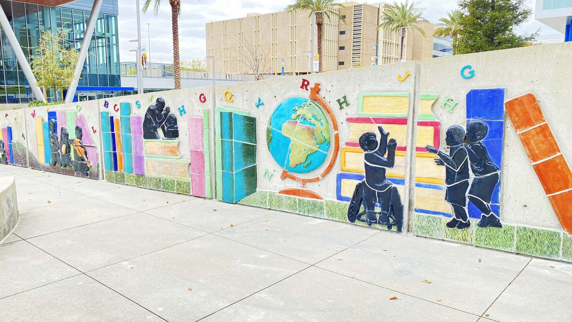 The “Eternal Learning” mural outside the James R. Watson and Judy Rodriguez Watson College of Education is the fifth piece sponsored by the Judy Rodriguez Public Art Project.