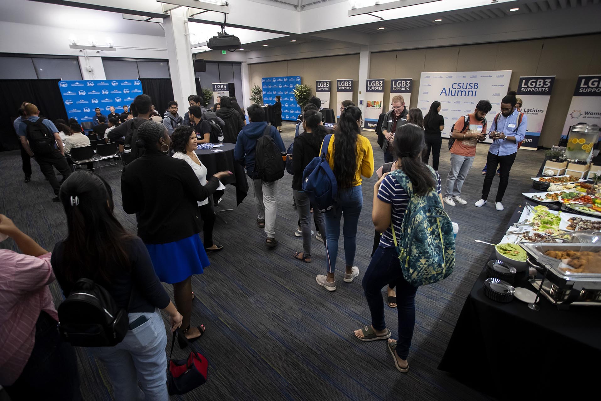 Students and alumni gather at a career night with the CSUSB Alumni and Amazon.