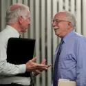 Two men speaking