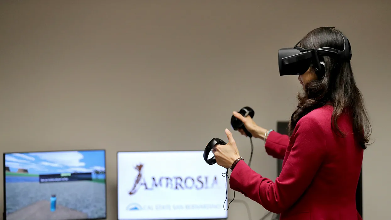 Rueyling Chuang, interim dean of CSUSB’s College of Arts & Letters, tries out a virtual reality computer program