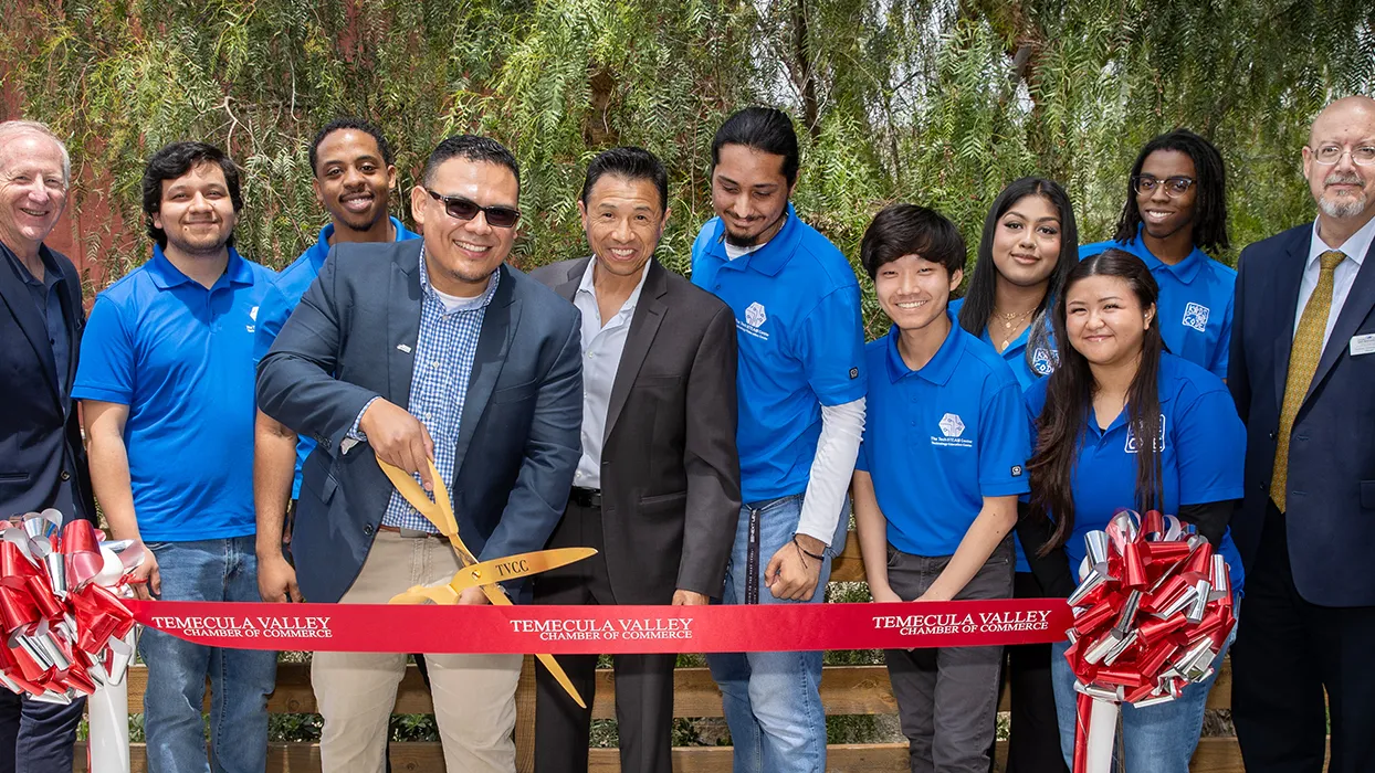 Jose Navarrete Cruz, one of the founders of Kids That Code, Inc., cuts the ribbon at the May 24 grand opening ceremony of his and co-founder Alfonso Anaya, Jr.’s new venture, The Tech Steam Center in Temecula.