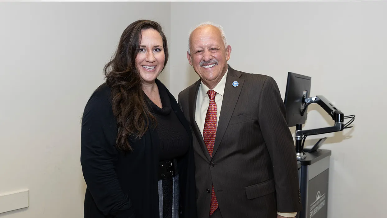 Julie Taylor, associate professor of communication and media, was overcome with emotion when she was surprised with the Outstanding Faculty Advisor Award from CSUSB President Tomás D. Morales.