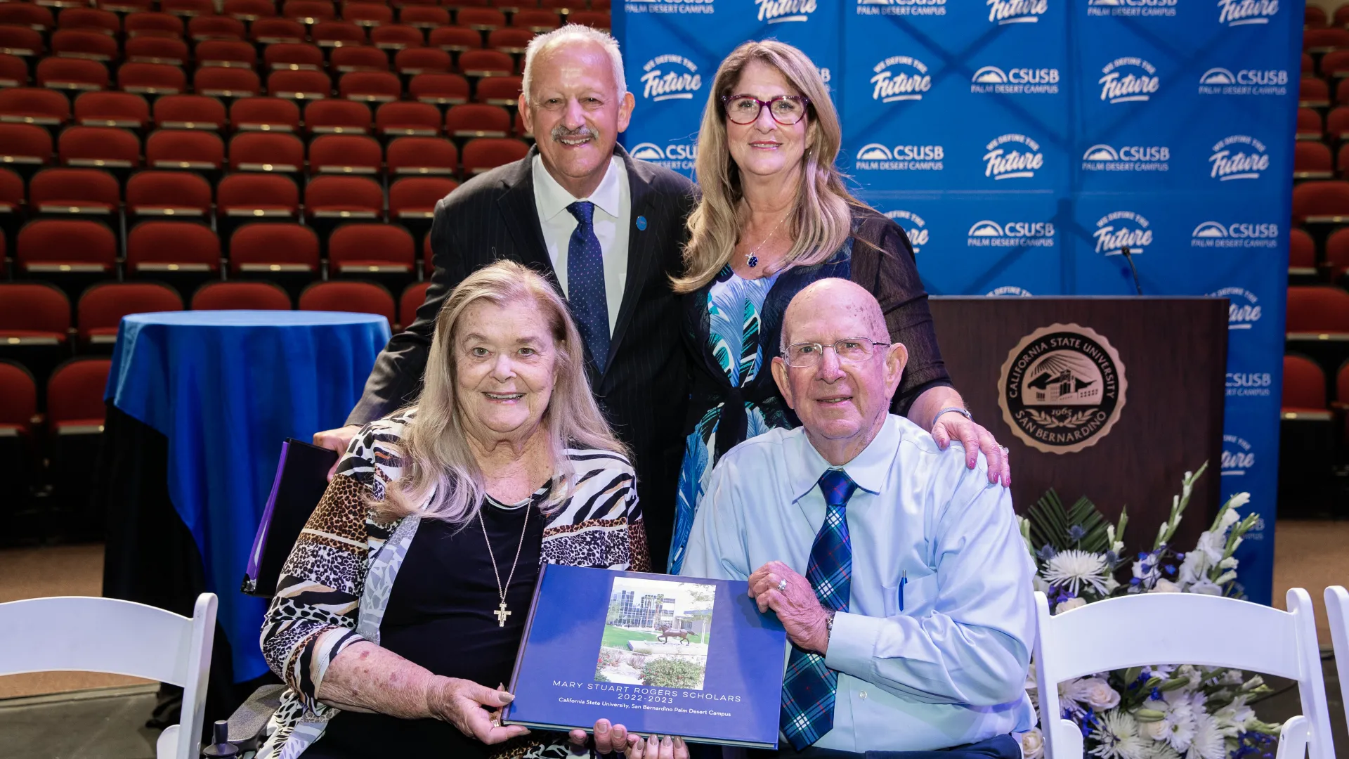 CSUSB President Tomás D. Morales poses for a photo with John, June and Janet Rogers at the 2022 Rogers Scholars Dinner