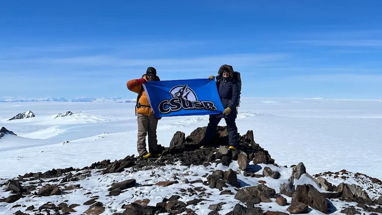 College of Natural Sciences’ students, Jacob Baker and Karina Ramirez, display Coyote Pride while on a research expedition to the Antarctica.