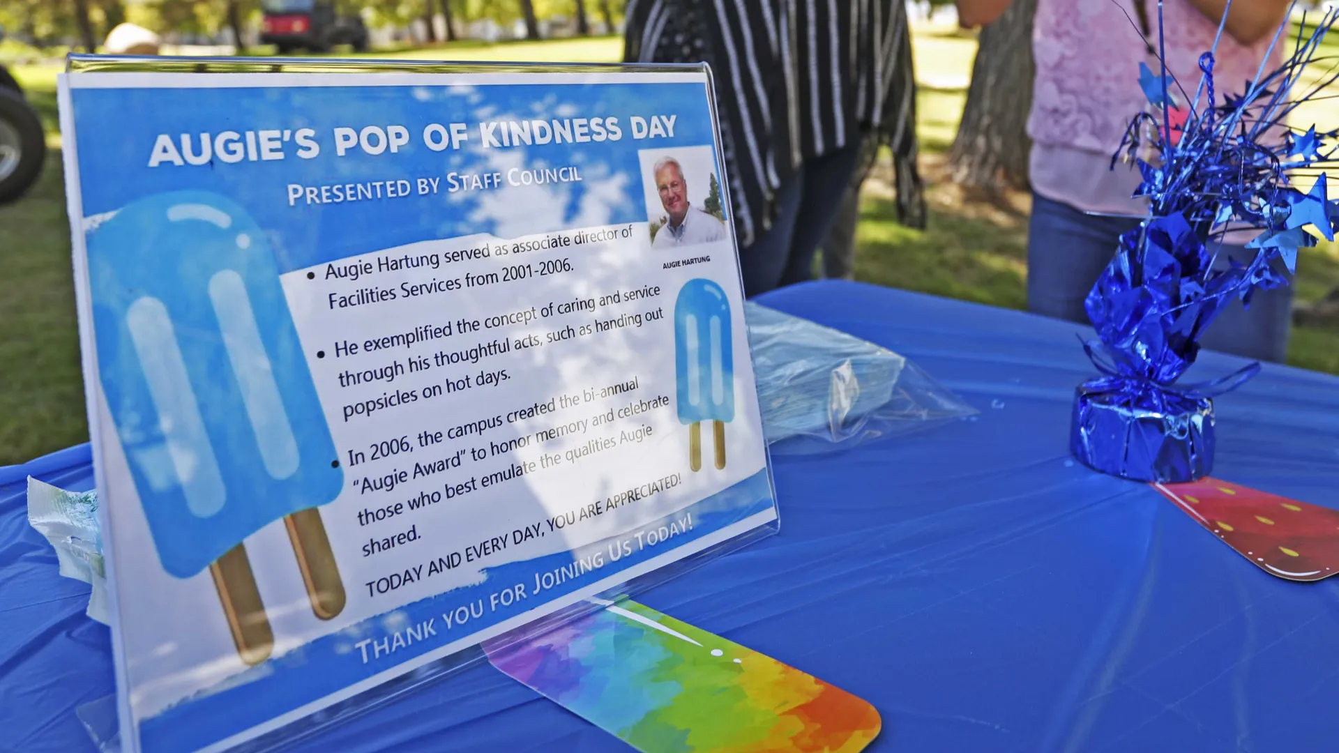A table for “Augie’s Pop of Kindness Day’ that celebrates the legacy of kindness personified by the late Augie Hartung.