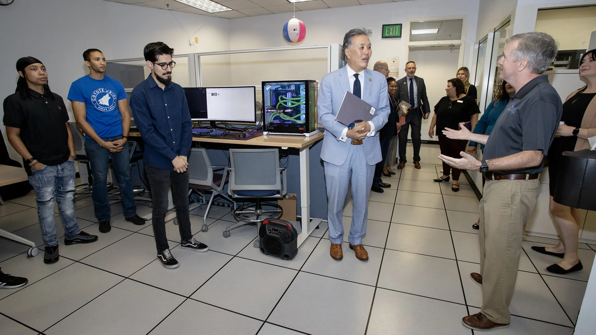 U.S. Rep. Mark Takano of Riverside (second from right) meets with Tony Coulson (far right), executive director of the CSUSB Cybersecurity Center, September 2023.