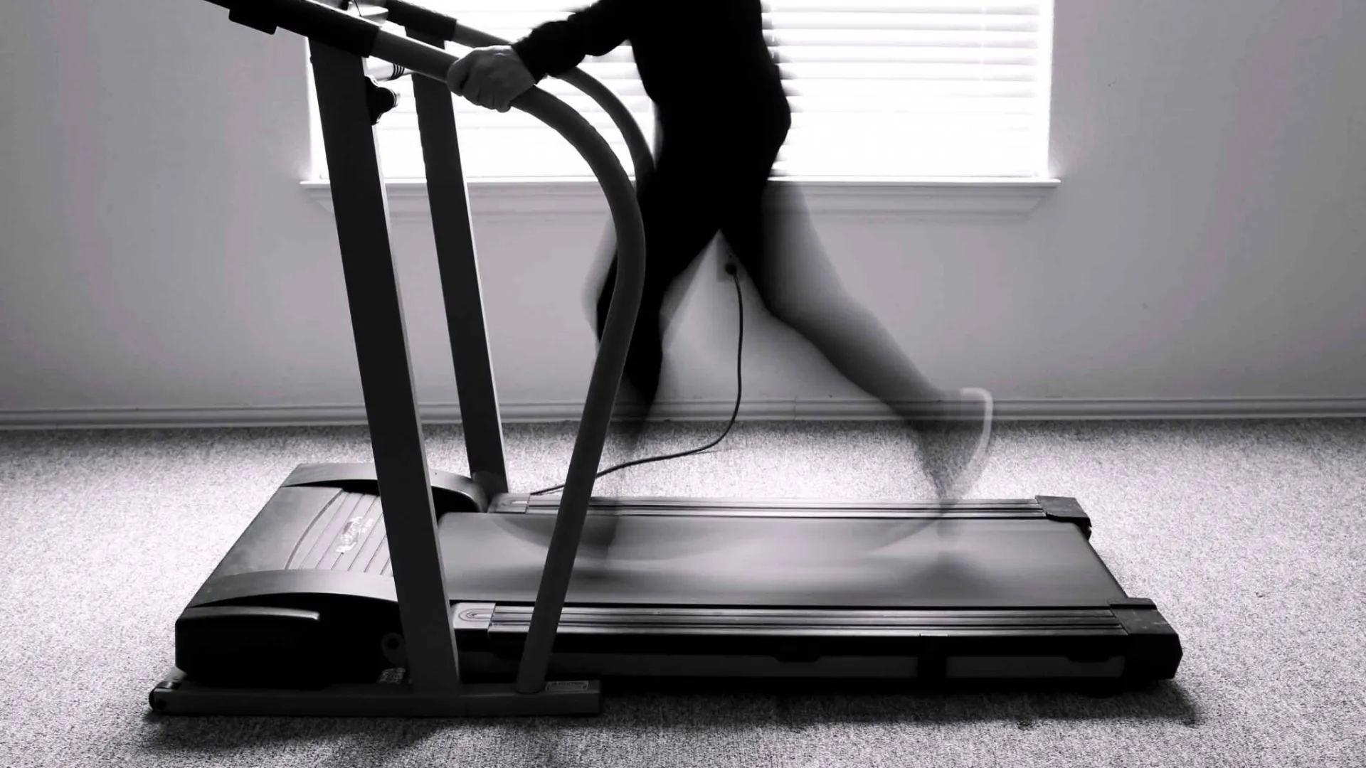 Exerciser on a treadmill.