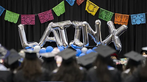 Latinx graduation recognition event photo.
