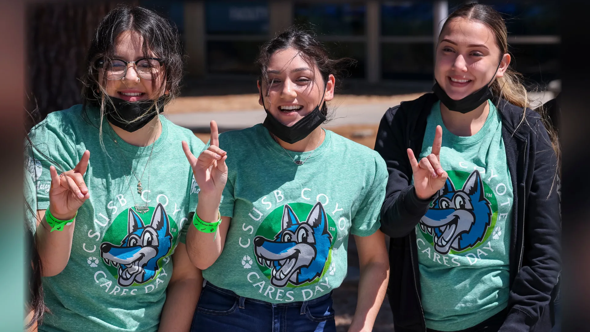 Three CSUSB student volunteers at the 2022 Coyote Cares Day