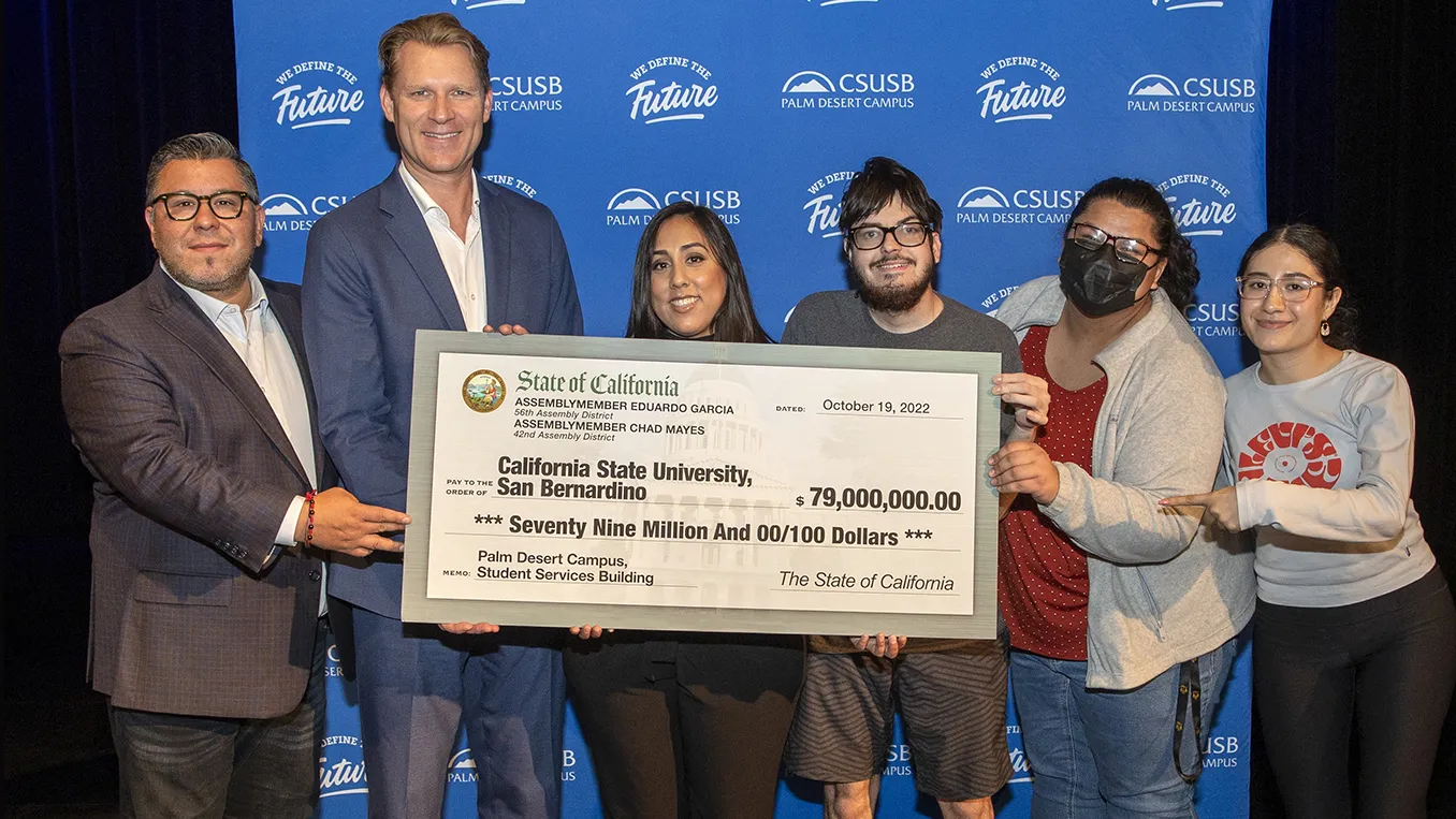 From left: Assemblymember Eduardo Garcia and Assemblymember Chad Mayes present a check to Sarah Lopez, CSUSB Palm Desert Campus vice president of Associated Students Inc.; Andrew Hunter, CSUSB student; Sasha Baltazar, Rancho Mirage Student Center coordinator; and Yunuen Cerano, student assistant