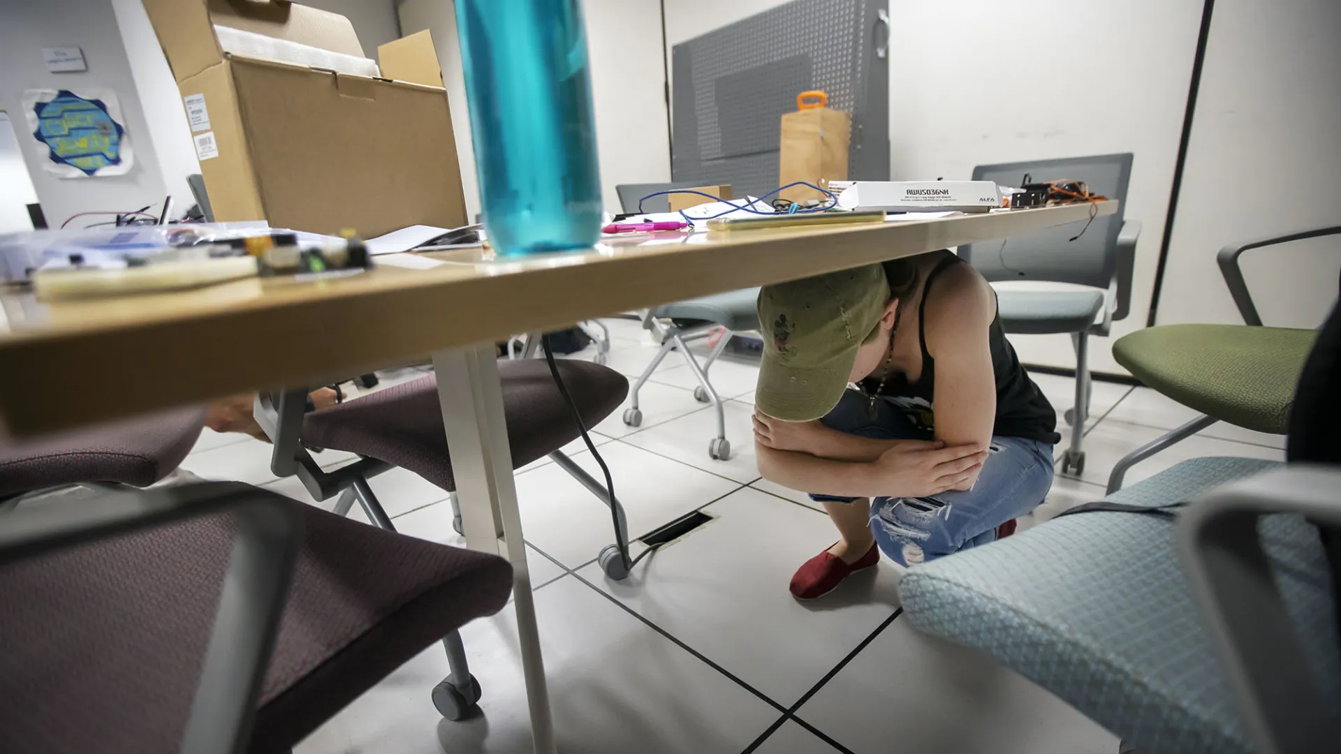 A CSUSB student in a previous Great ShakeOut earthquake drill.