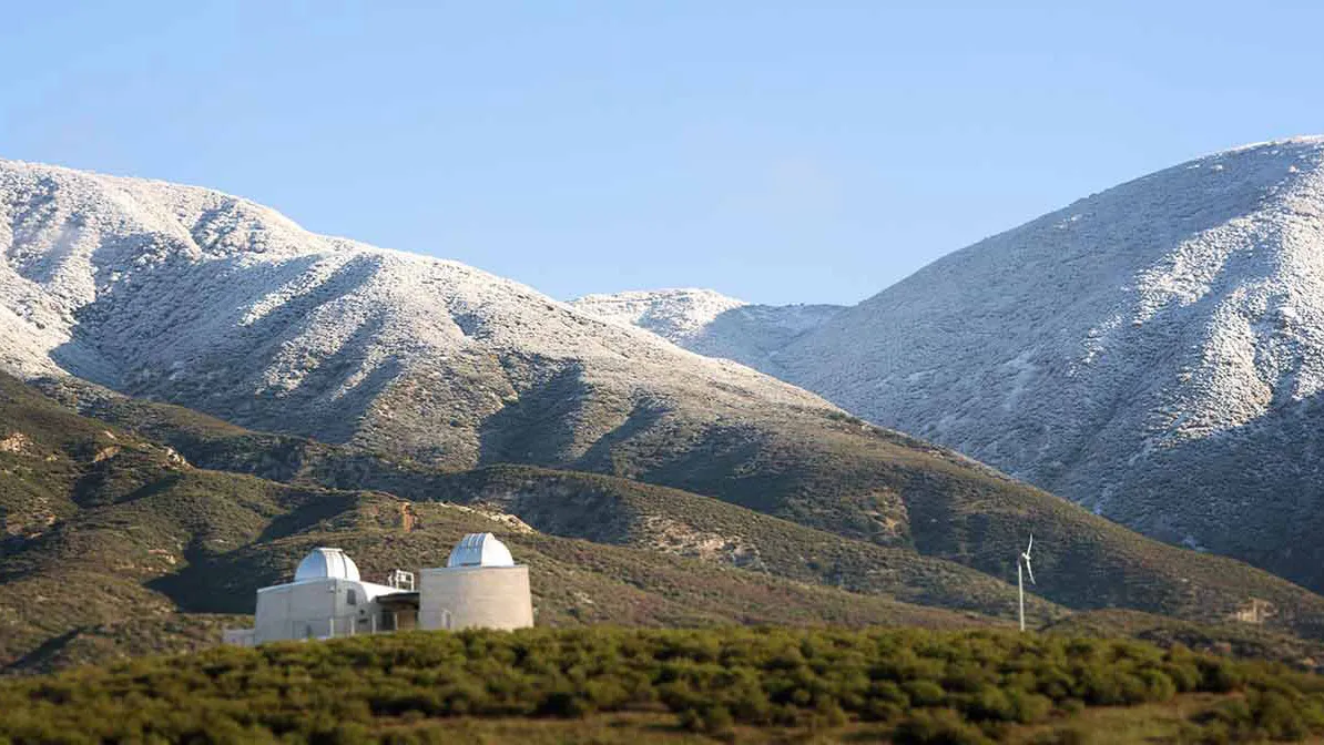 Snow-capped foothills and the Murillo Family Observatory
