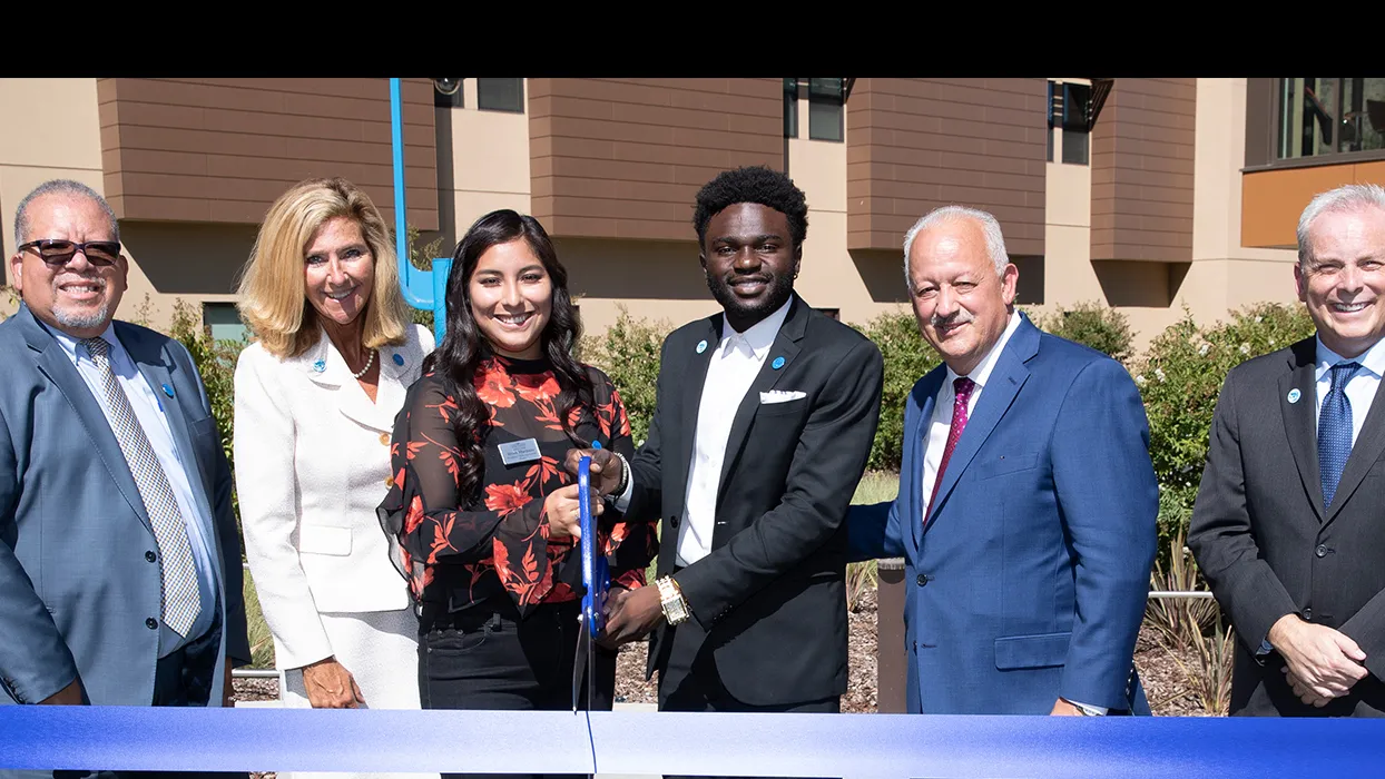 ribbon-cutting event for new student housing and dining complex