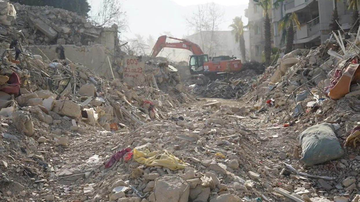 A rescue team is using a bulldozer to remove the rubbles in Antakya