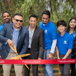 Jose Navarrete Cruz, one of the founders of Kids That Code, Inc., cuts the ribbon at the May 24 grand opening ceremony of his and co-founder Alfonso Anaya, Jr.’s new venture, The Tech Steam Center in Temecula.