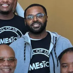 Marc Robinson (second row at far right in the gray sweat jacket) was one of the participants at the 2024 Catalyst Retreat organized and led by Black Male Educators Talk (BMEsTalk). 