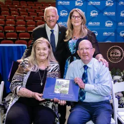 CSUSB President Tomás D. Morales poses for a photo with John, June and Janet Rogers at the 2022 Rogers Scholars Dinner