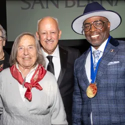 From left, Shelby Obershaw, Ingeborg Schuler, CSUSB President Tomás D. Morales, Terrance L. Stone.