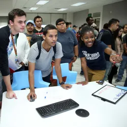 Students at an open house event by the CSUSB Cybersecurity Center. The Department of Defense Cyber Scholarship Program (DoD CySp) has awarded three full scholarships to students in the CSUSB cybersecurity program.