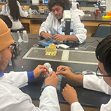 Image of UB participants involved in a STEM activity