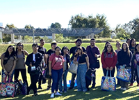 Twenty-three young adults from the Coachella Valley who participate in the TRIO Educational Opportunity Center at CSUSB attend a College and Career Exploration Day at the University of Redlands in fall 2023