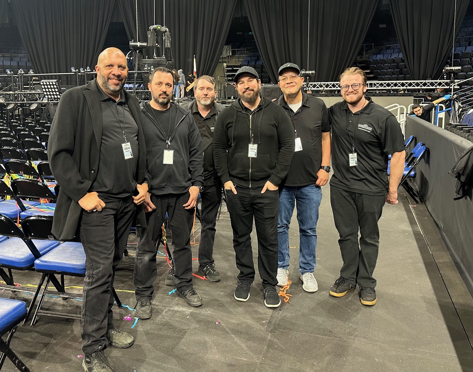 Six men from the CSJUSB media production team at commencement 