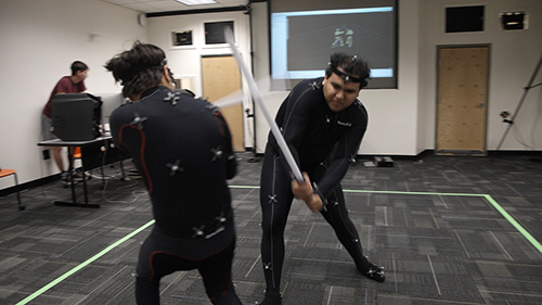 2 men in motion capture suits 