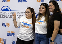 Three CSUSB students celebrate at the 2022 Californians For All College Corps Launch Party and Swearing-in Celebration for 58 CSUSB students joining the program. The university has been selected as a 2024-26 College Corps campus.