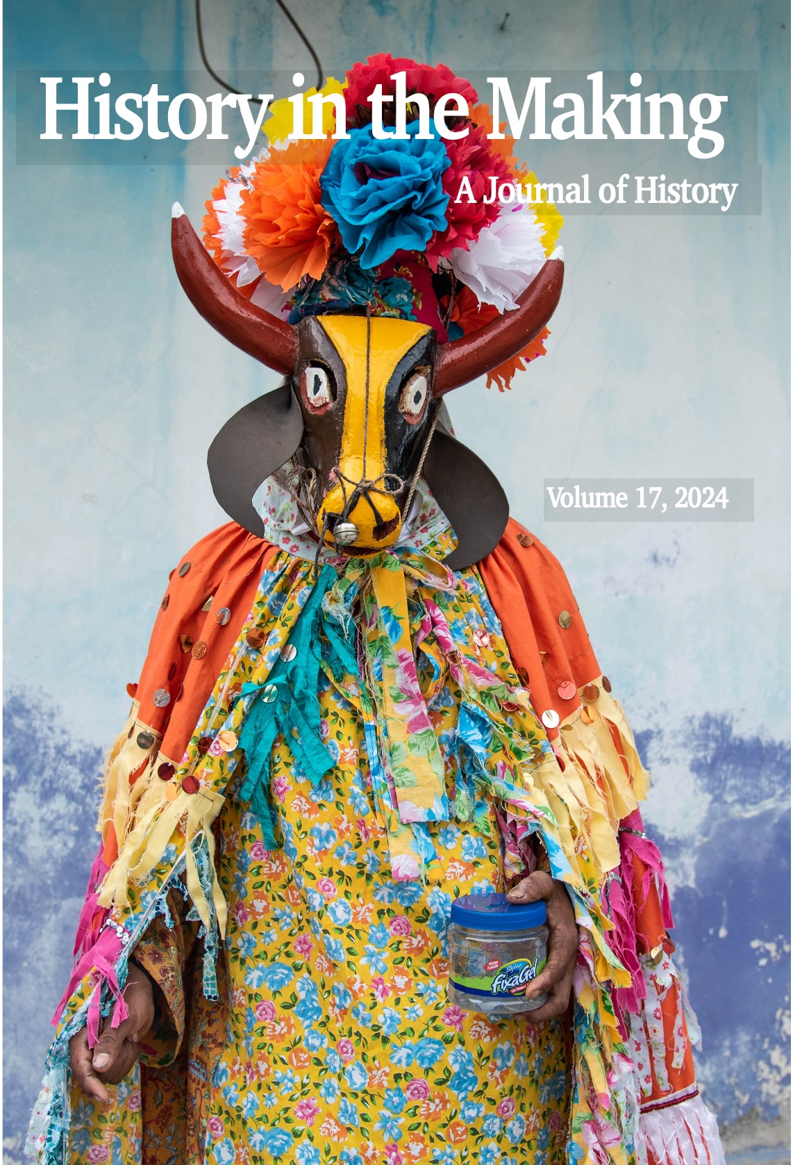 History in the Making Cover, man dressed in colorful cow costume for Afro-Mexican festival