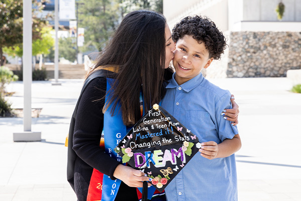 CSUSB graduate with her son.
