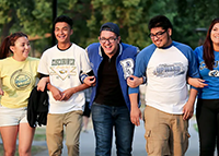 Former Upward Bound students walk the CSUSB campus