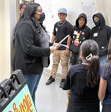 Image of Cal SOAP students visiting a CSUSB exhibit