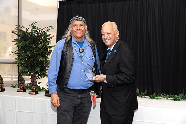 James Fenelon with university President Tomás D. Morales.