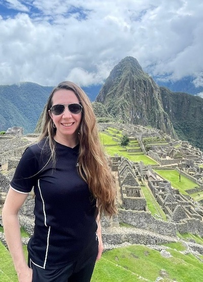 Lady Guillen with Machu Picchu in background