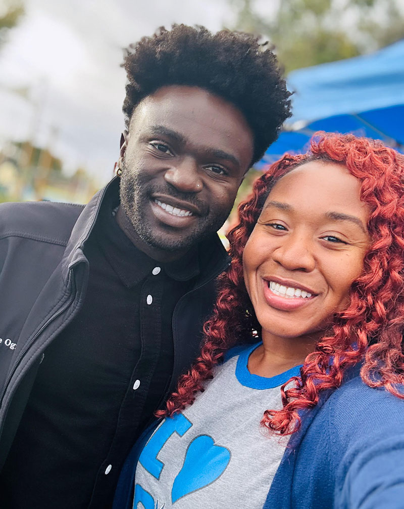 CSUSB alumnus Prince Ogidikpe and Camelia Fowler of CSUSB’s Office of Community Engagement at the Caramel Connections Foundation’s Food and Resource Giveaway Rally.