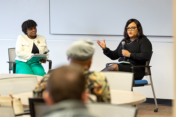 Francisca Afua Opoku-Boateng (left) and Donna Nicol discuss the trailblazing legacy of Claudia H. Hampton, the first Black woman trustee in the California State University system.