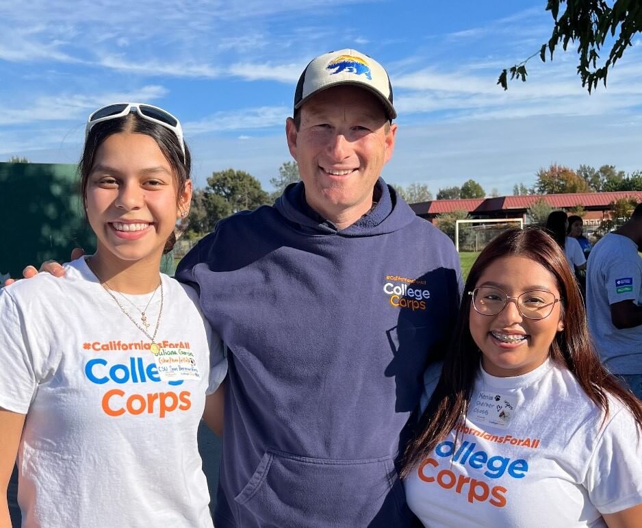 Photo of College Corps students posing with Josh Fryday