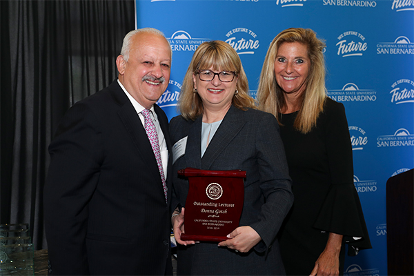 From left, CSUSB President Tomás D. Morales, Gotch and Shari McMahon, former CSUSB provost, at the 2018-19 Faculty Recognition Luncheon.