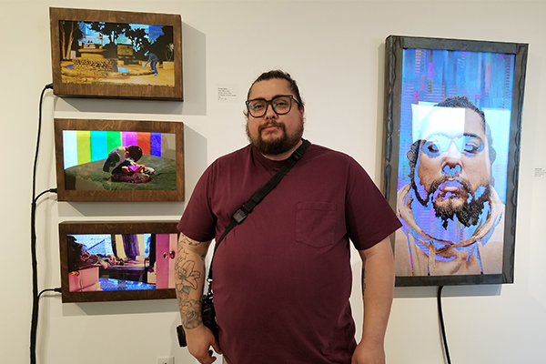 Santos Nunez with his pieces, “Previously On . . .,” “Touch Glass,” and “Zoom In.” 