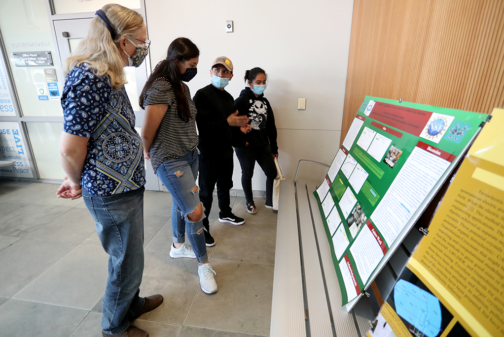 Associate Dean Sally McGill and students with CREST Scholar Gonzalo Perez