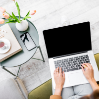 Person typing on a laptop computer